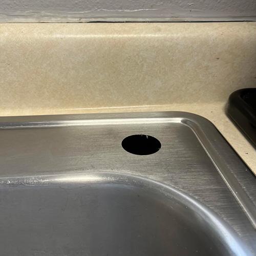 Drilling perfectly-sized holes for pipes and plumbing fixtures.